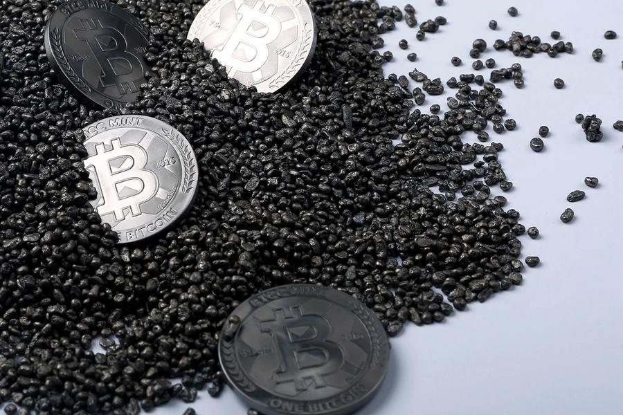 Crypto coins on a dark surface