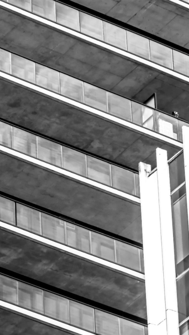 A black and white office building facade